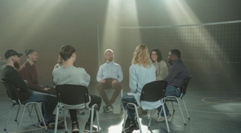 Group of people sitting together in a therapy setting